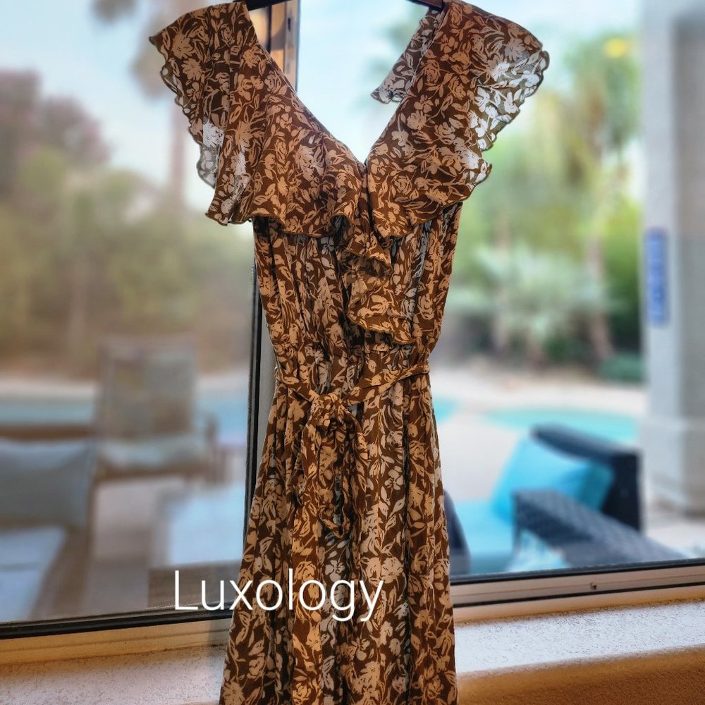 Sleeveless jumpsuit with ruffle neckline